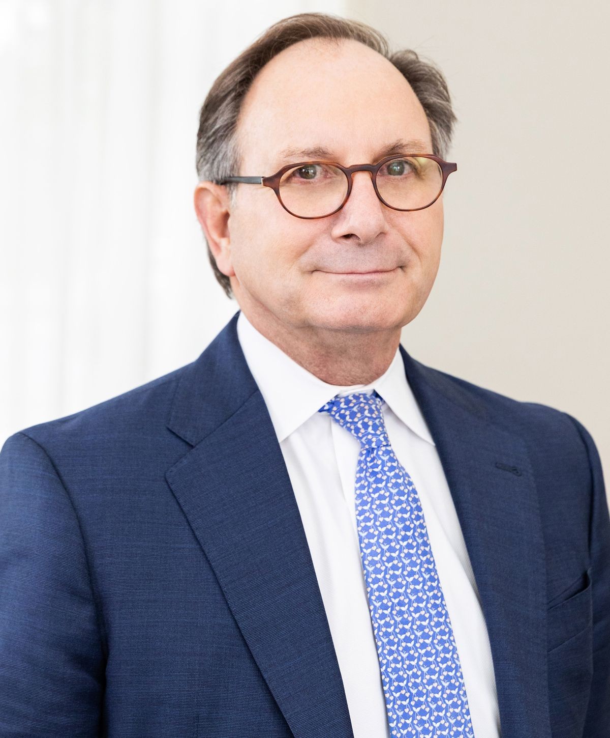 Model in casual lingerie setting indoors.