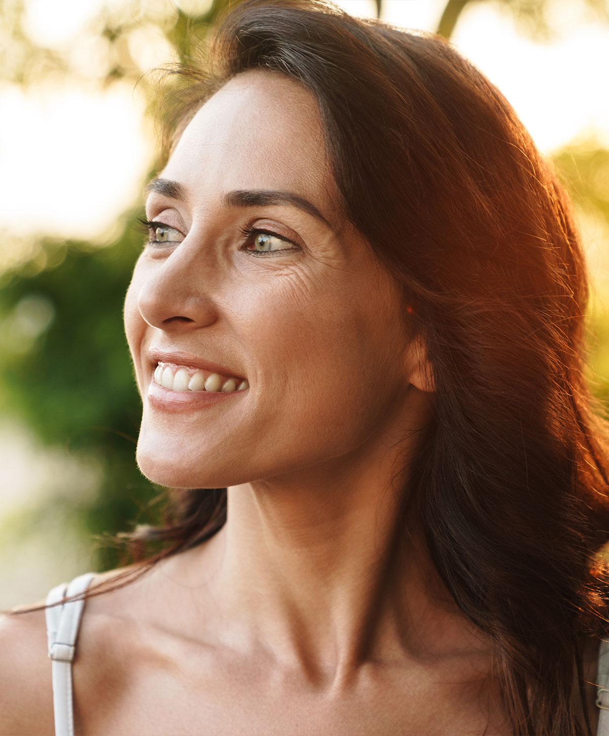 Woman in blue lace bra with long hair.
