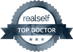 RealSelf Top Doctor award graphic badge.